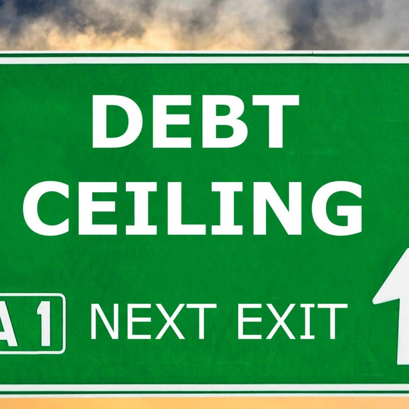 Debt,Ceiling,Road,Sign,Against,Clear,Blue,Sky