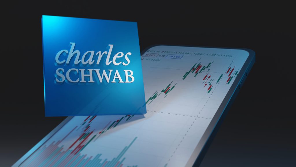 Charles,Schwab,Logo,And,Font,On,Dark,Background,With,Smartphone